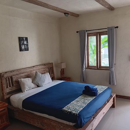 Adore Guesthouse Amed Quarto foto
