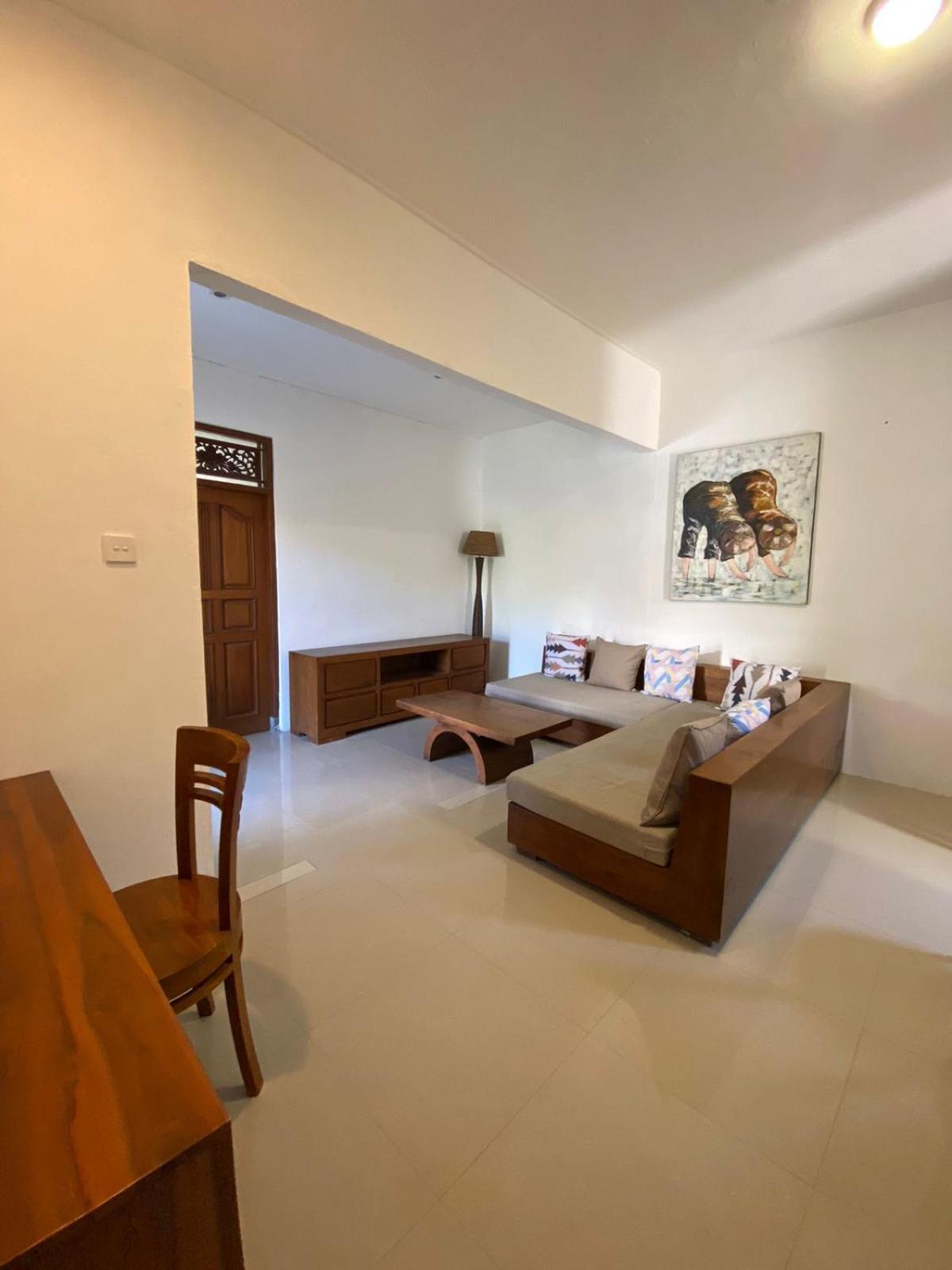 Adore Guesthouse Amed Quarto foto