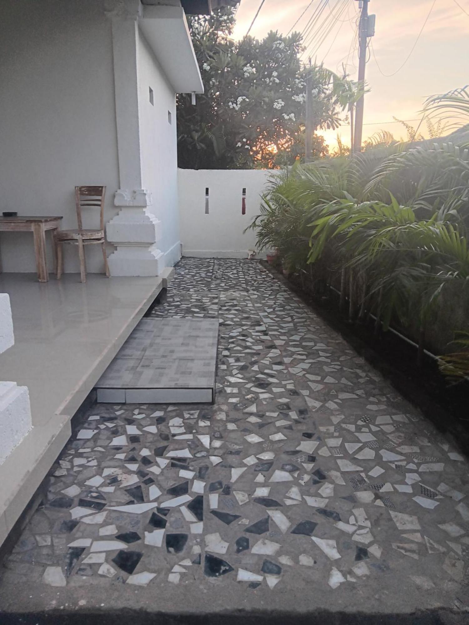 Adore Guesthouse Amed Quarto foto