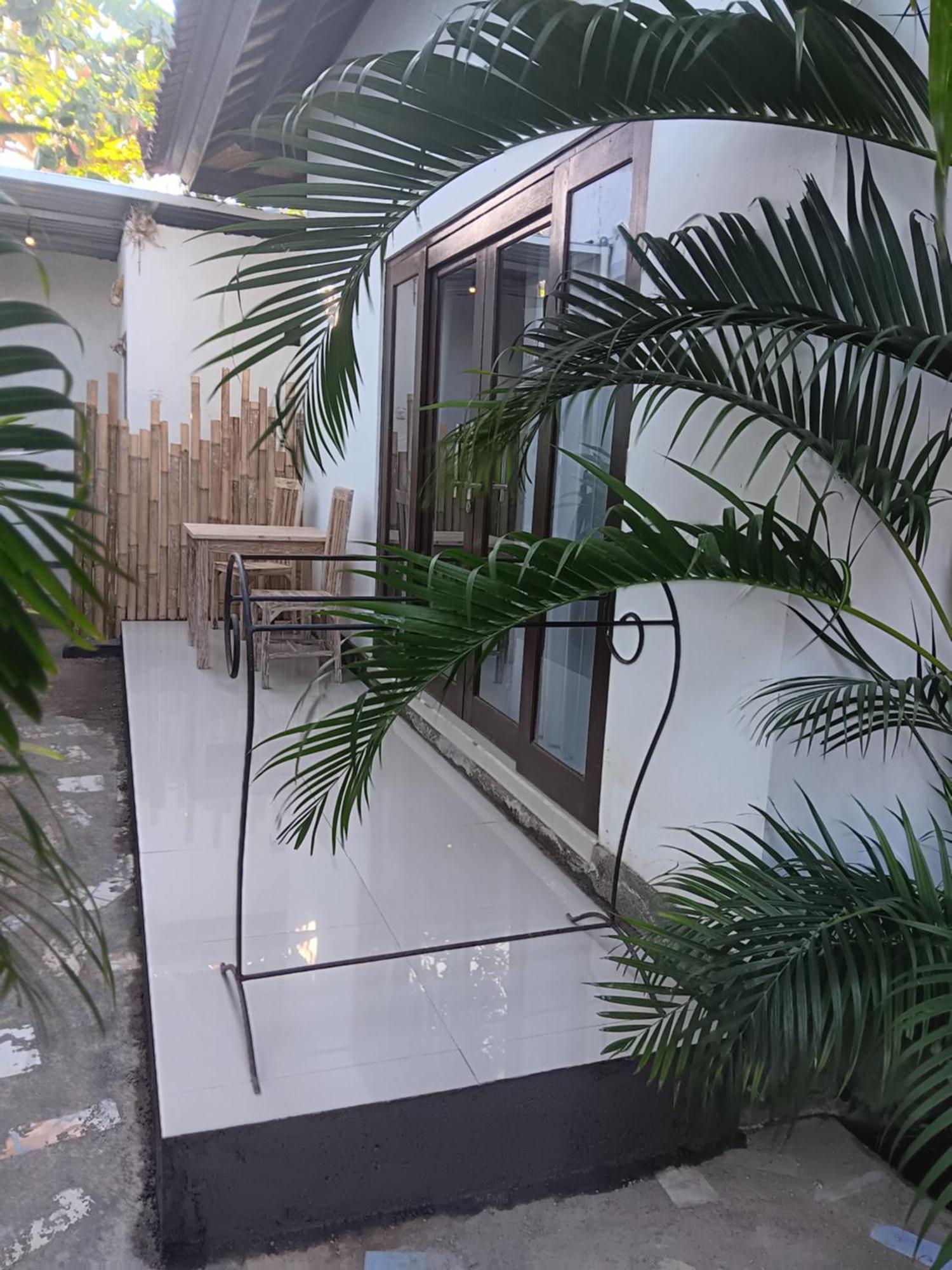 Adore Guesthouse Amed Quarto foto